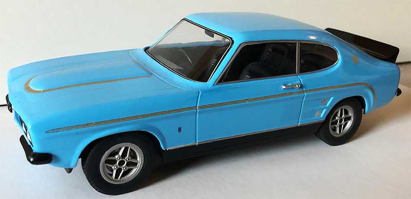 Ebenso habe ich drei englische RS 3100 in Olympic Blau, Sebring Rot und Modena Grün nachgebaut. Mit Front- und Heckspoiler, RS Streifen in Gold. Basis links: CMG-Modell. Basis rechts: Minichamps-Modell. Beim CMG-Capri habe ich die normalen Serienkotflügel auf RS- Kotflügel mit Spachtel verändert. Ebenso habe ich drei englische RS 3100 in Olympic Blau, Sebring Rot und Modena Grün nachgebaut. Mit Front- und Heckspoiler, RS Streifen in Gold. Basis links: CMG-Modell. Basis rechts: Minichamps-Modell. Beim CMG-Capri habe ich die normalen Serienkotflügel auf RS- Kotflügel mit Spachtel verändert.