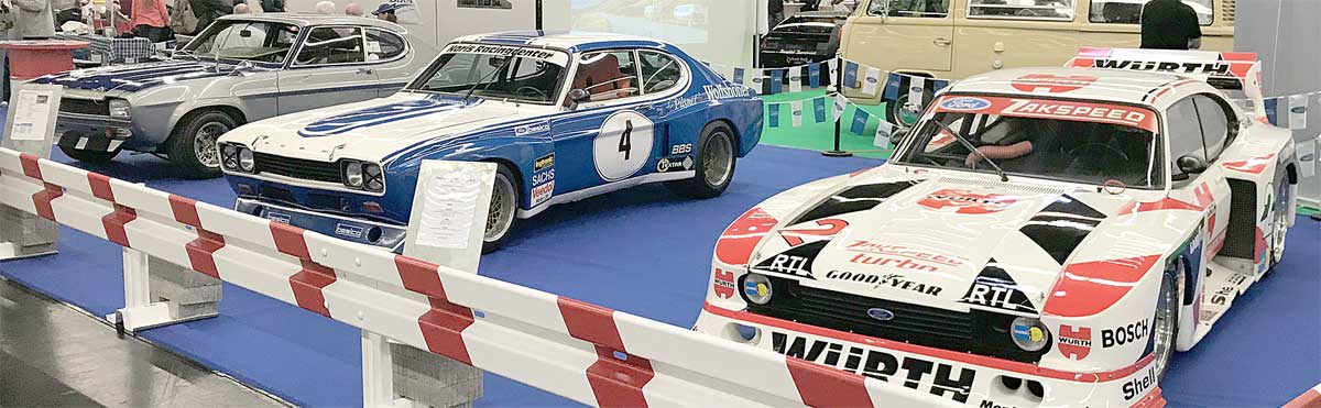 Georg Klughardt zauberte mit den drei Werkscapri der Motorsportabteilung Rennsportatmosphäre pur in die Messehalle. Von links: Leichtbau-Weslake, Gruppe 2-RS und Gruppe 5-Zakspeed. Der CCD war mit einem Infostand vor Ort. Georg Klughardt zauberte mit den drei Werkscapri der Motorsportabteilung Rennsportatmosphäre pur in die Messehalle. Von links: Leichtbau-Weslake, Gruppe 2-RS und Gruppe 5-Zakspeed. Der CCD war mit einem Infostand vor Ort.